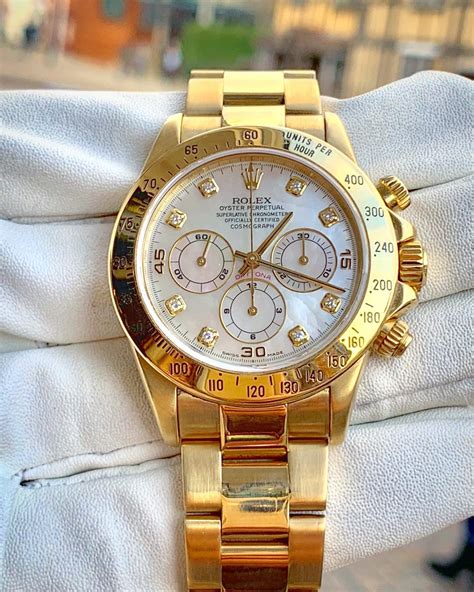 rolex daytona yellow gold price.